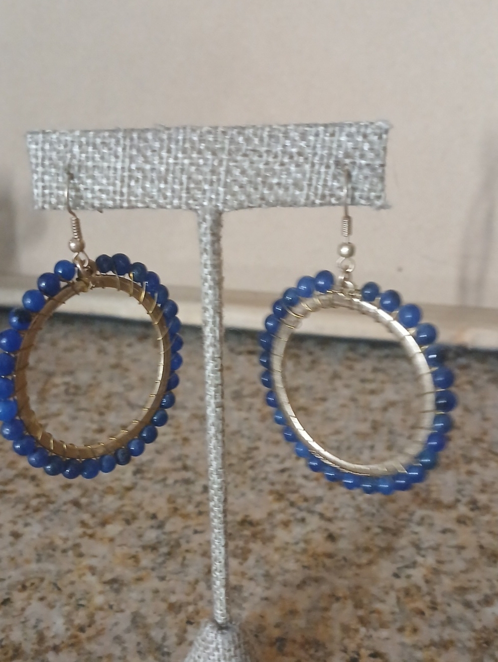 Gold Hoop Earrings with Blue Beaded Accent